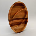 Wooden tray with a natural finish on a white background