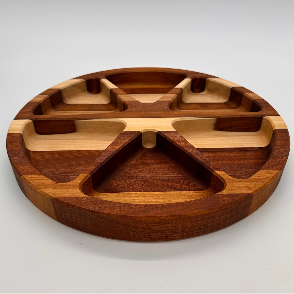 Wooden tray with divided sections on a white background