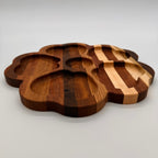 Wooden cutting board with a unique design on a light gray background