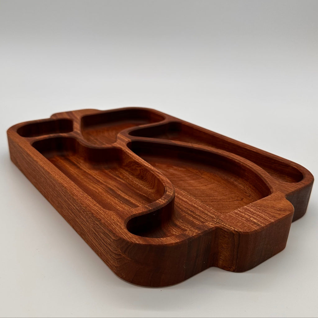 Wooden tray with unique design on a white background