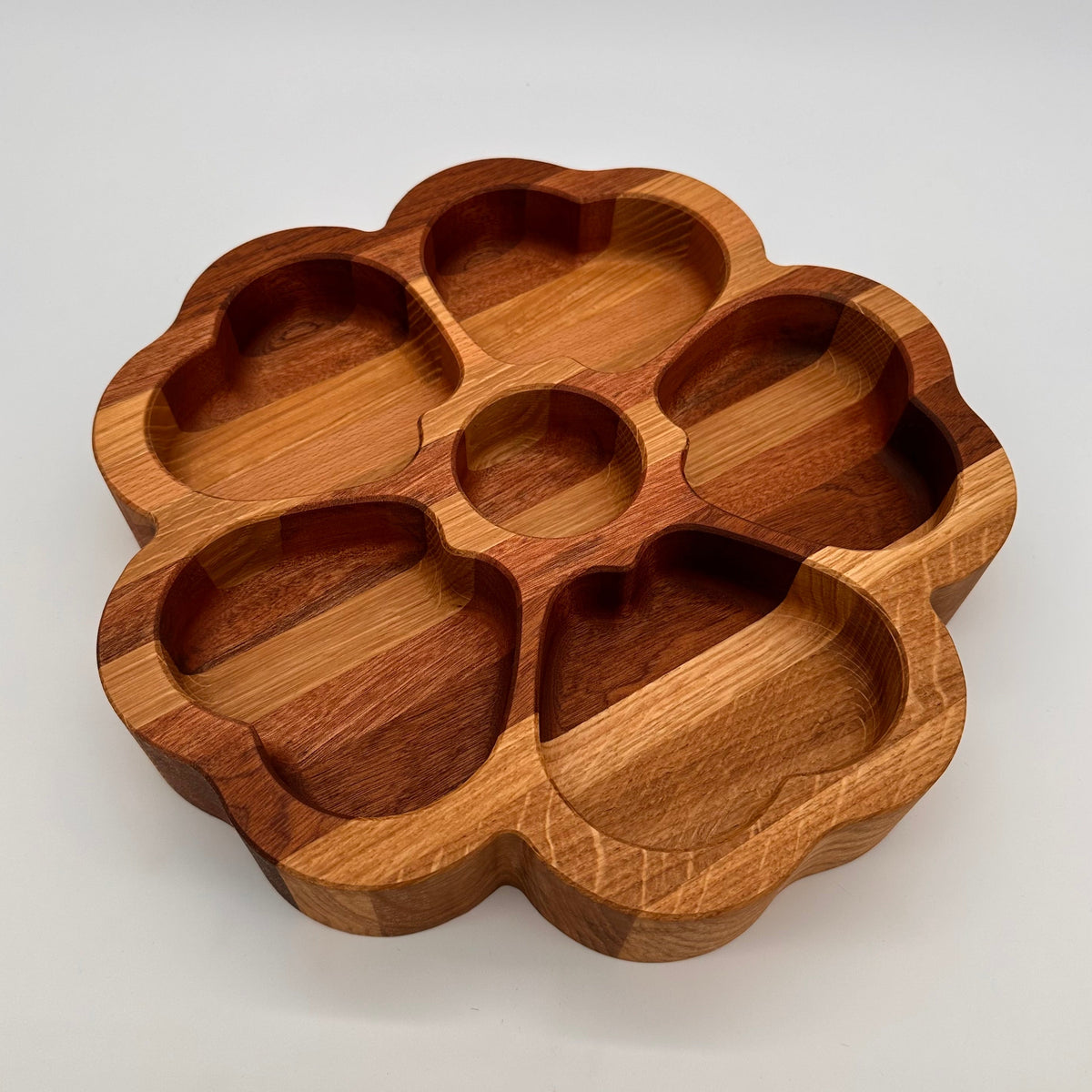 Wooden tray with six compartments on a white background