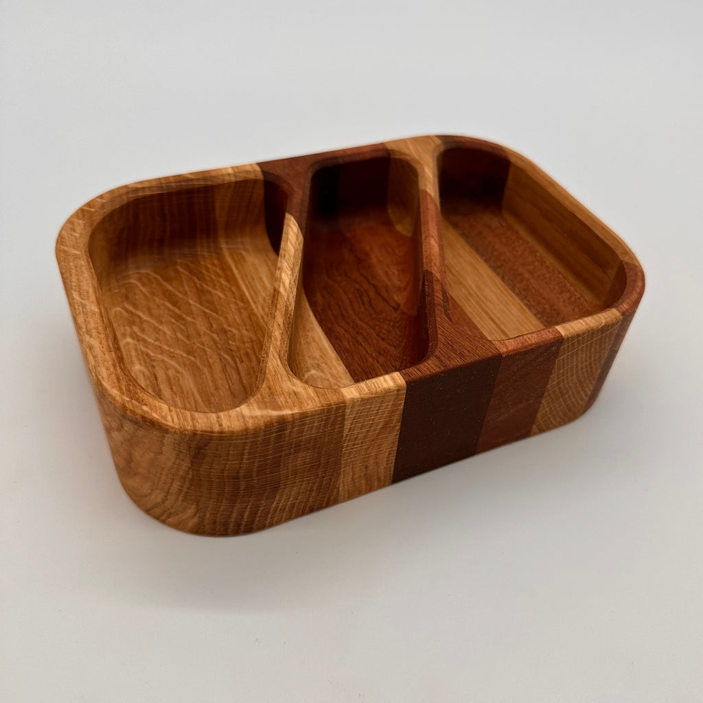 Wooden divided plate on a white background