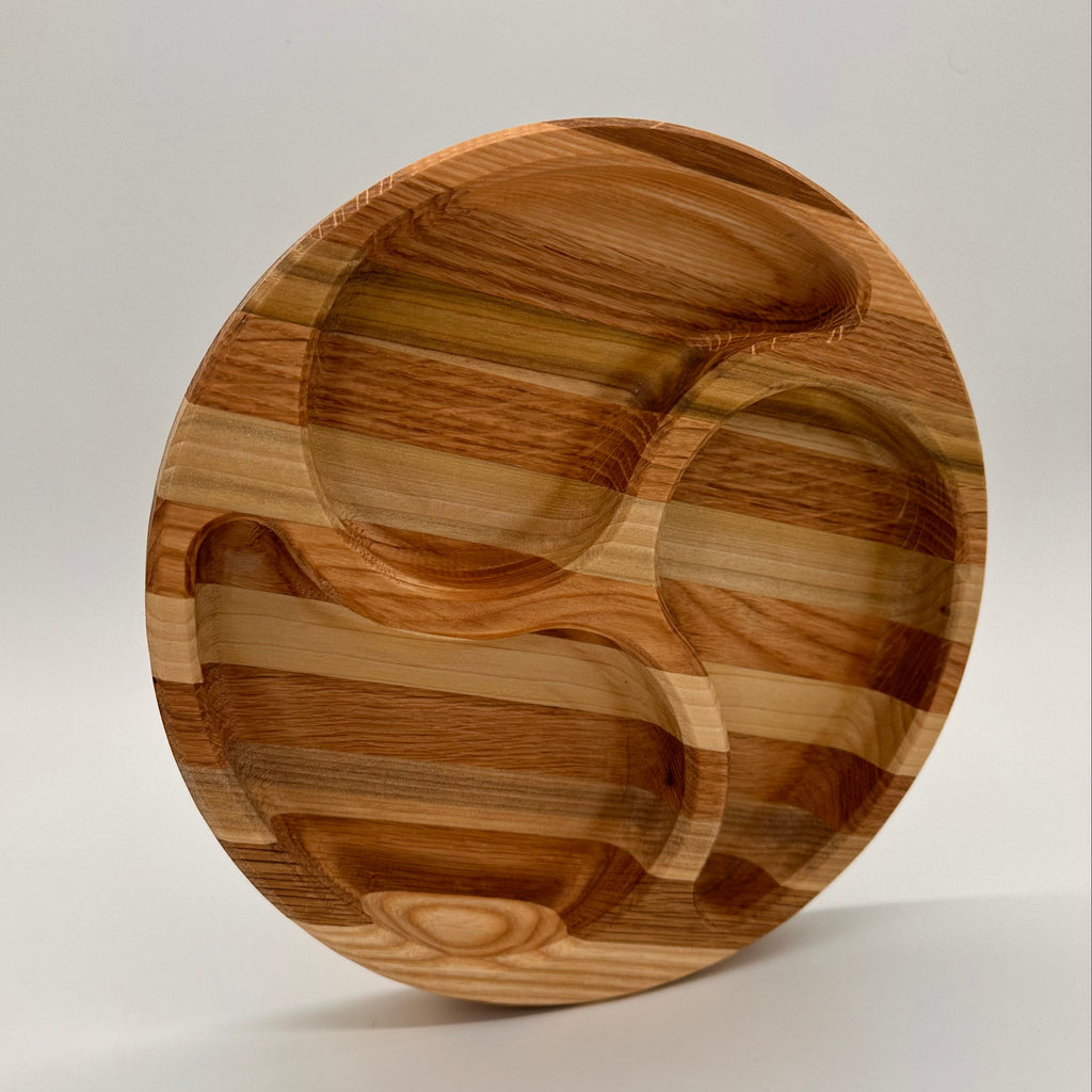 Wooden plate with a unique design on a light gray background