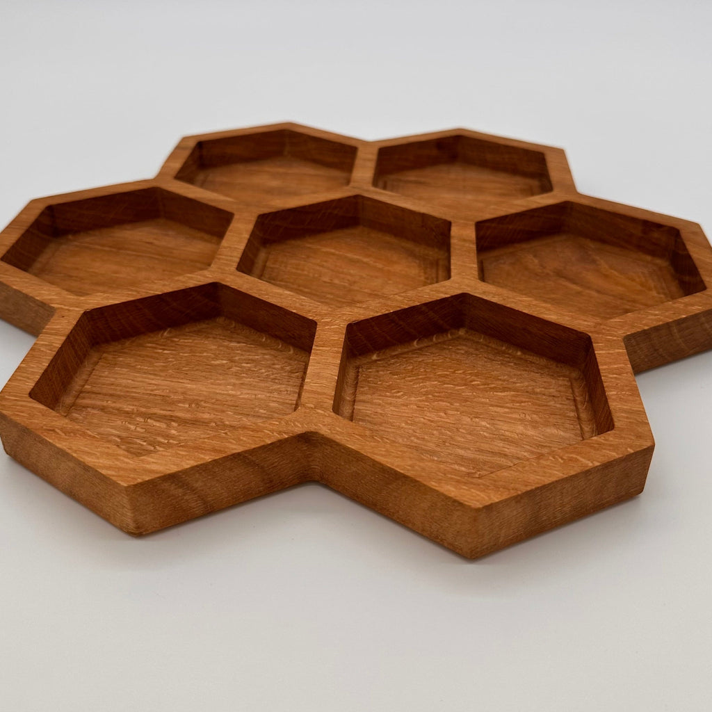 Wooden honeycomb tray on a white background