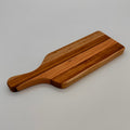 Wooden cutting board on a gray background