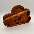 Wooden cloud-shaped cutting board on a white background