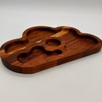 Wooden tray with cloud design on a white background
