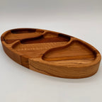 Wooden tray with divided sections on a white background