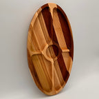 Wooden cutting board with分区设计 on a white background