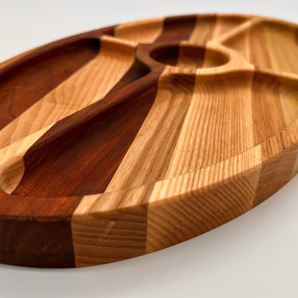 Wooden cutting board with a unique design on a white background