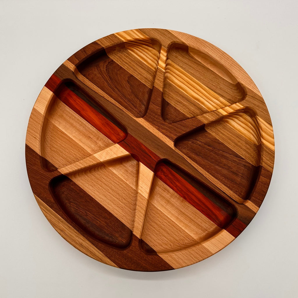 Wooden cutting board with geometric design on a light gray background