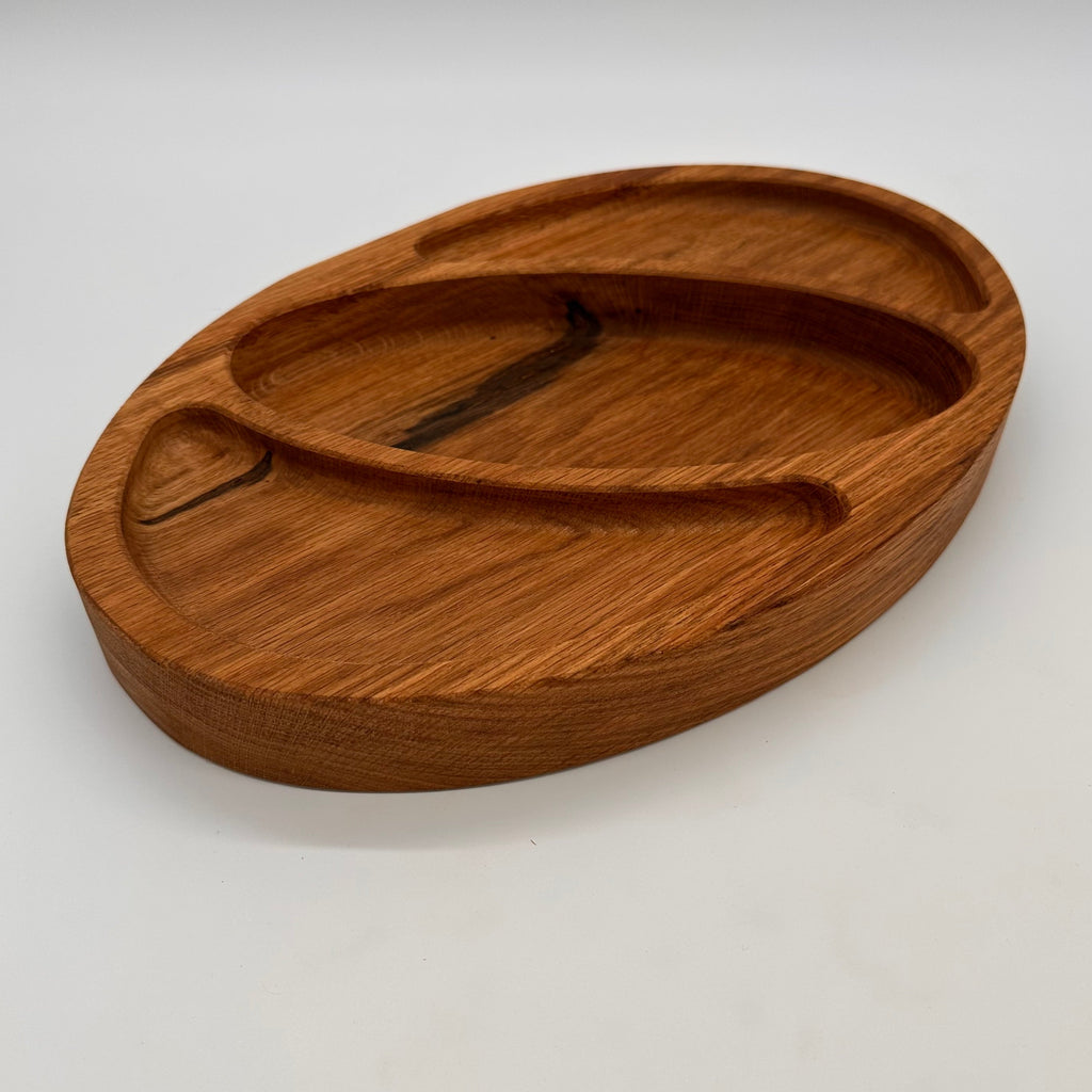 Wooden tray with cutouts on a white background