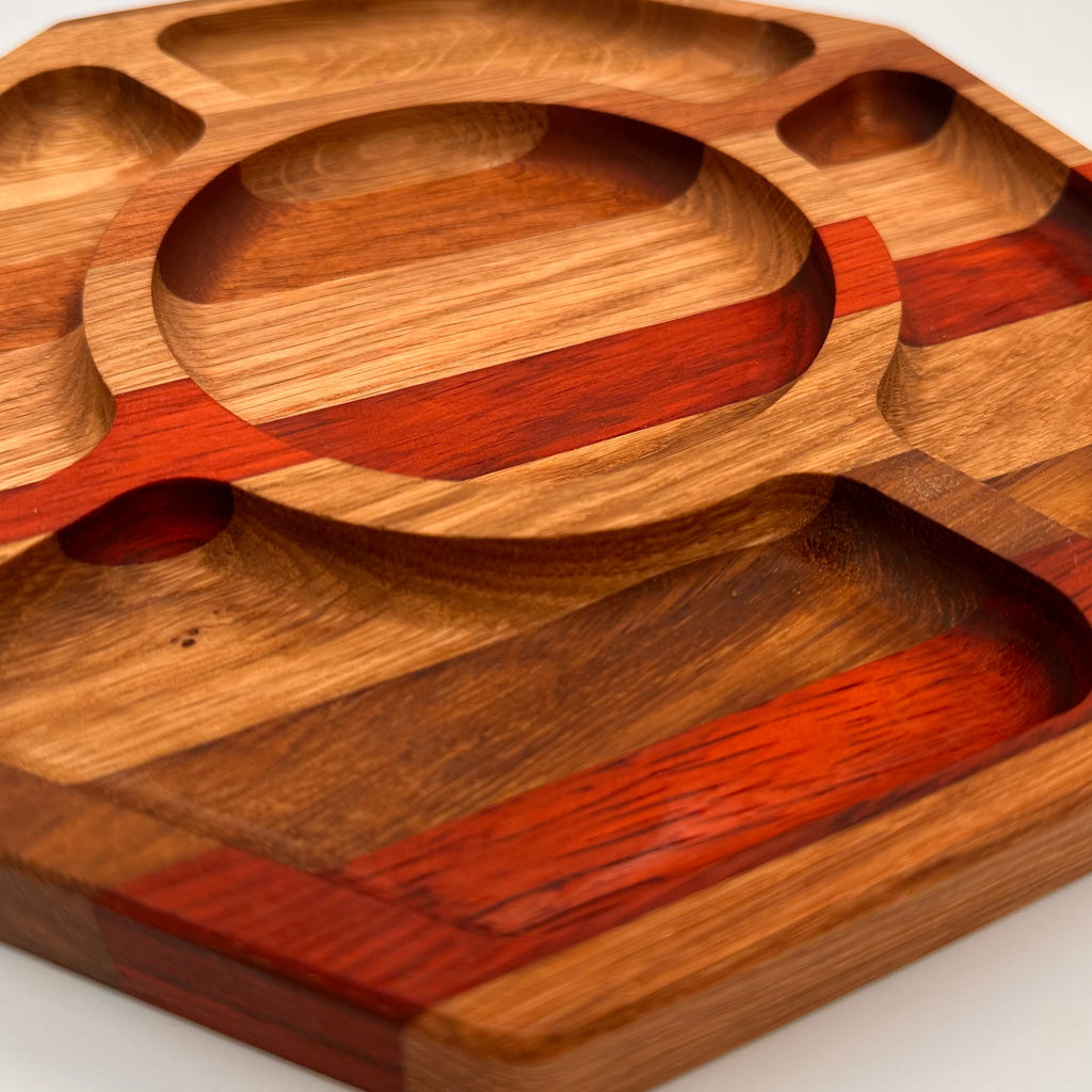 Wooden tray with geometric design on a white background