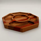 Wooden tray with multiple compartments on a white background