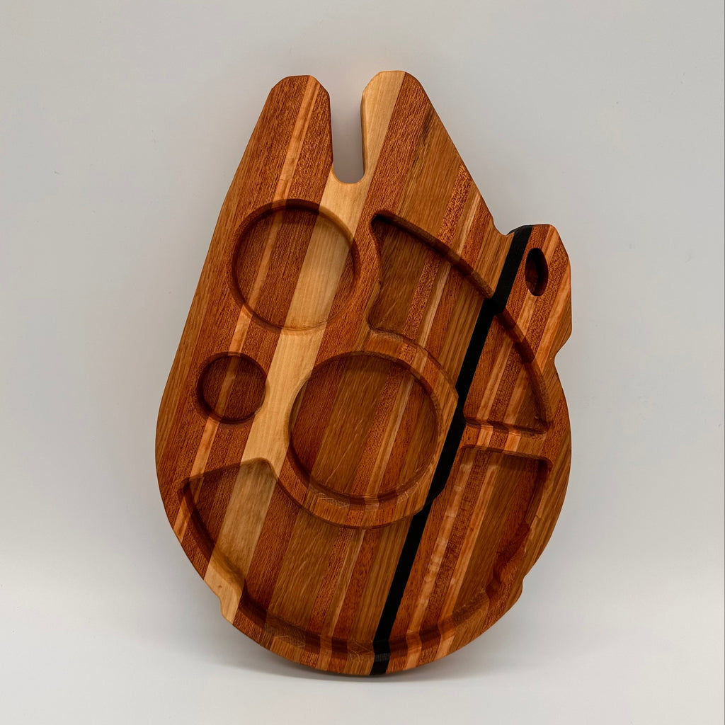 Wooden cutting board with geometric shapes on a light gray background