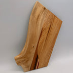 Wooden cutting board on a gray background