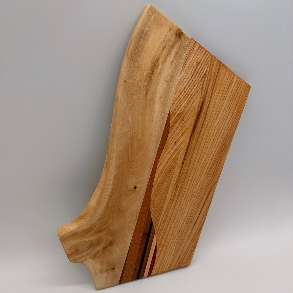 Wooden cutting board on a gray background